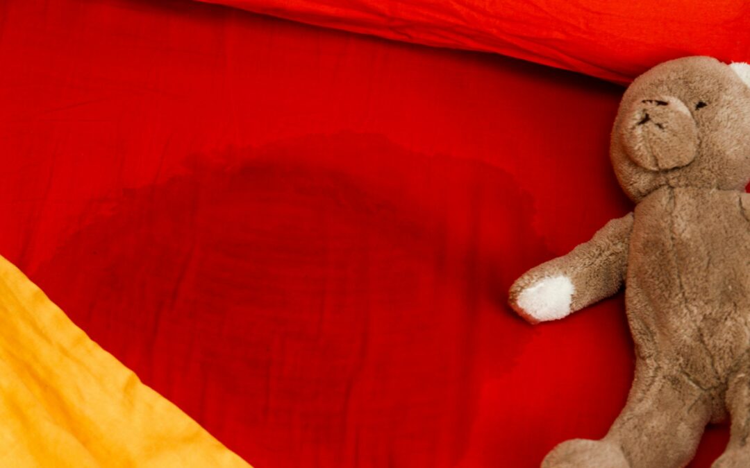 Perché i bambini fanno la pipì a letto? Le cause dell’enuresi notturna